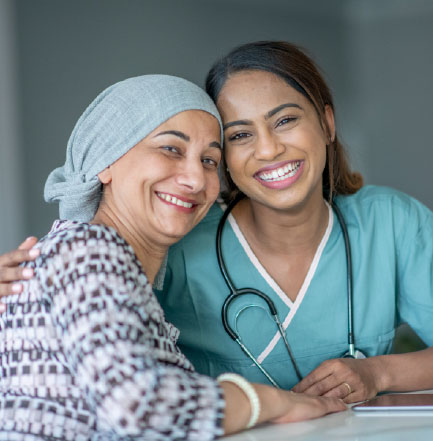 cancer patient hugging nurse